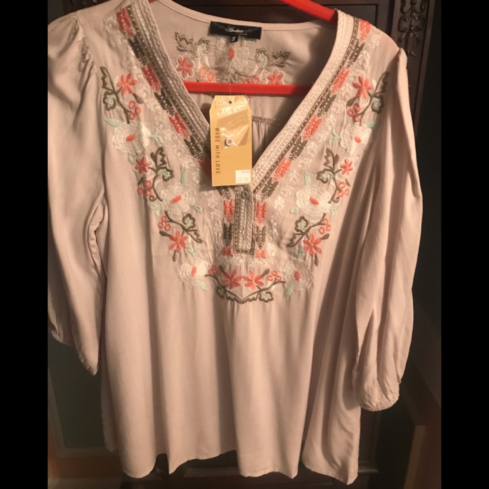 Boho Blouse by Andree’.size small. Light sleeves.